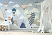 The balloons are in various shapes and colors.

