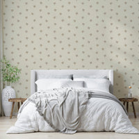 Neutral-toned wallpaper with whimsical bird details

