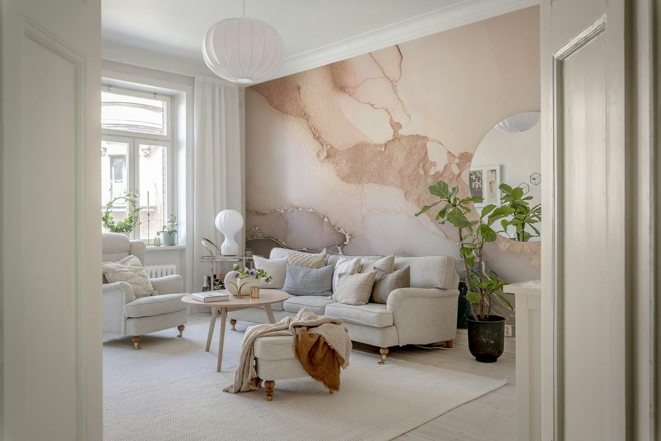 Modern living room featuring the beautiful Dreamy Mineral Layers Rose Gold Wall Mural.