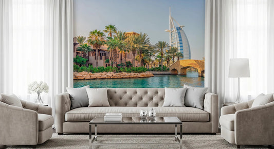 Spacious living room arranged around Dubai skyline mural with greenery accents