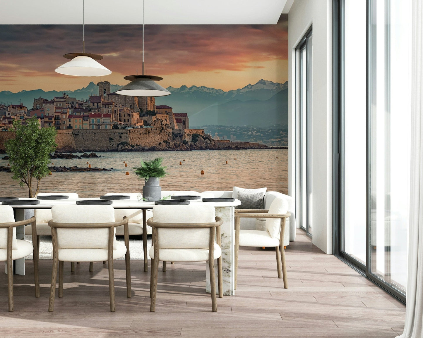 Snowy mountain backdrop behind city on Dusk at Antibes wallpaper for walls.