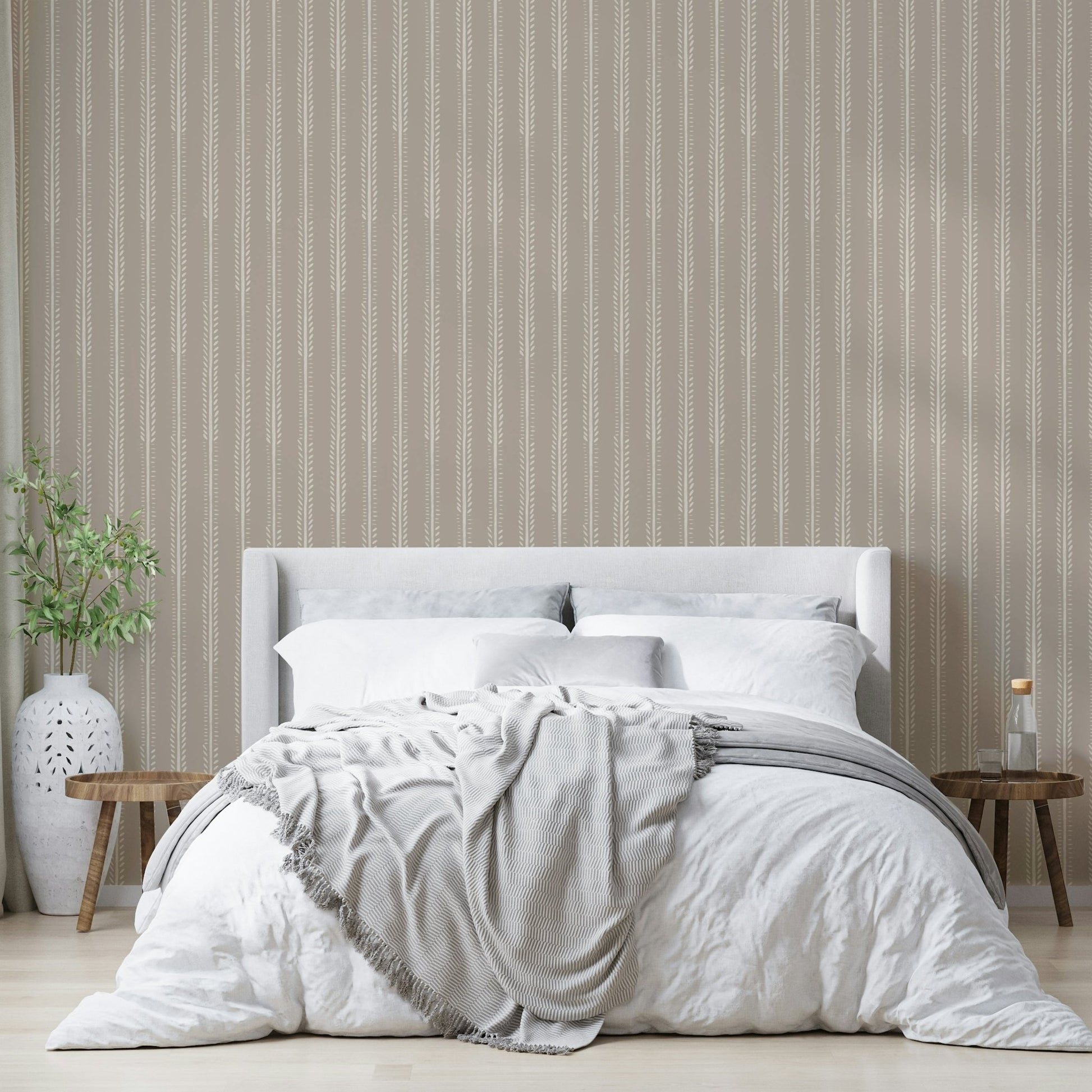 Warm striped wallpaper featuring leafy designs

