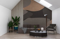 Pebble-like shapes sit behind a family living room in Earthy Organic Abstract wall mural.GD9552