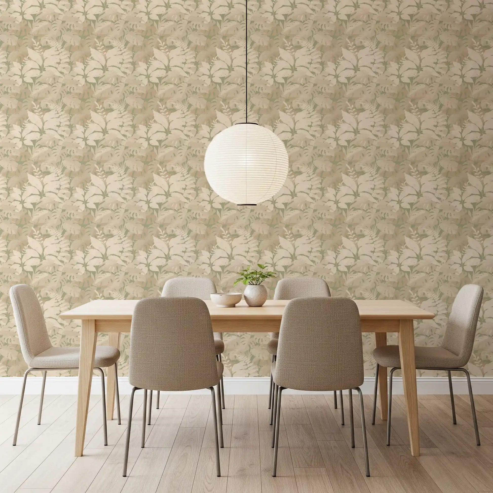 Earthy Tropics Silhouette Monstera Leaves Wallpaper in a softly lit dining room