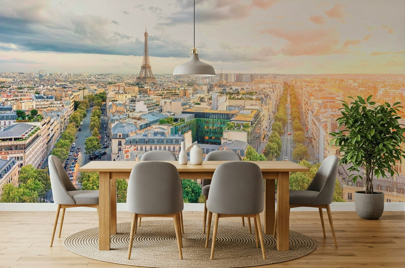 Dining room setup feels open with Eiffel's Dawn wall mural skyline scene