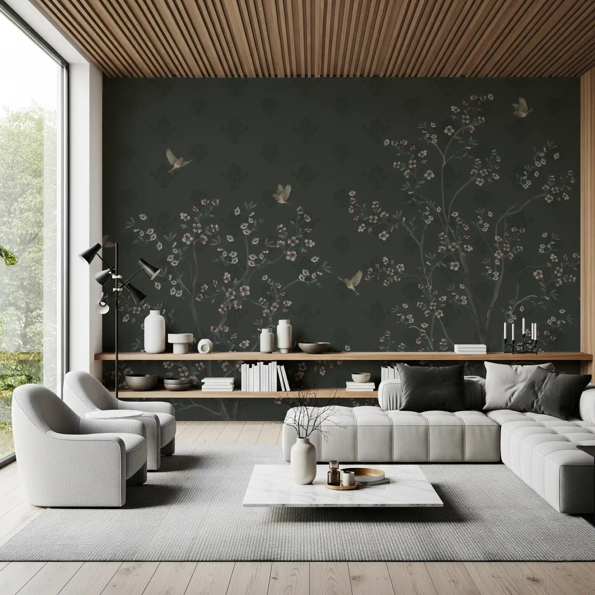 A curved sofa sits before Elegant Avian Bloom Wall Mural in a refined lounge