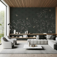 A curved sofa sits before Elegant Avian Bloom Wall Mural in a refined lounge