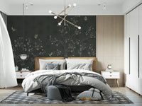 Soft bedding rests against Elegant Avian Bloom Wall Mural in a dark bedroom