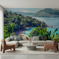 Emerald Coast Wall Mural creates a breezy coastal setting for this relaxed lounge area