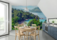 The dining corner feels fresher with Emerald Coast Wall Mural and island greenery beyond