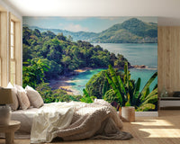 In this bedroom, Emerald Coast Wall Mural adds layered greenery and calm water depth