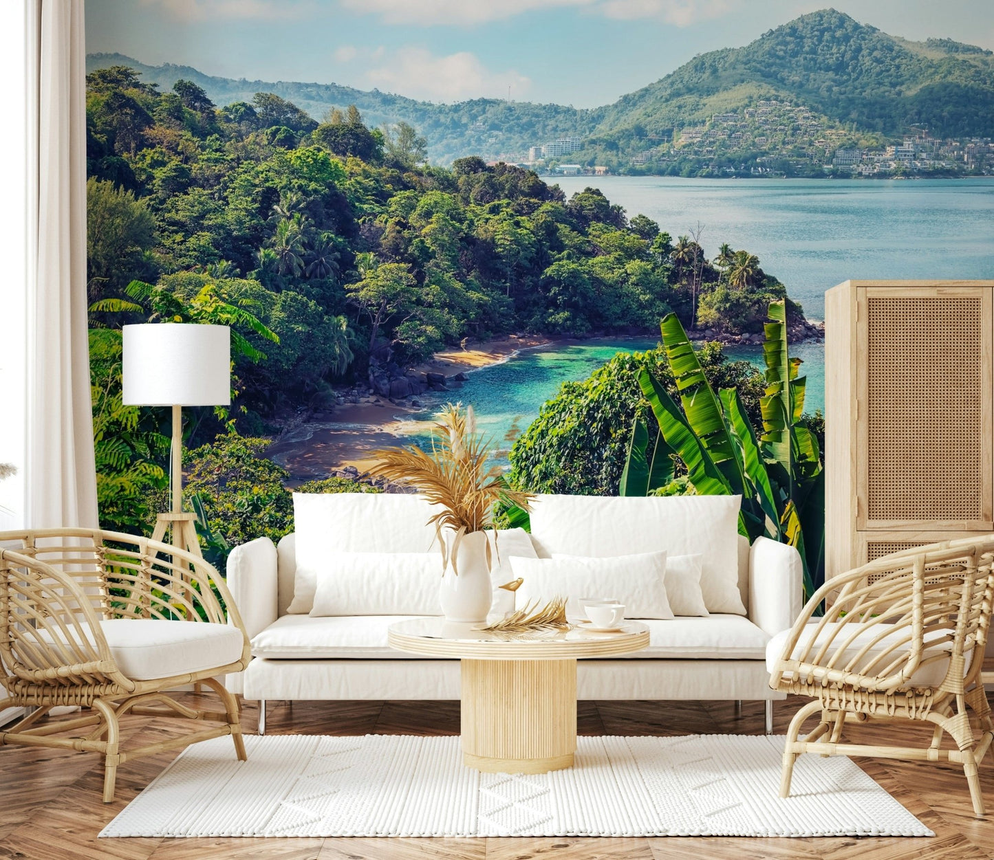 A bright seating room paired with Emerald Coast Wall Mural and lush shoreline detail