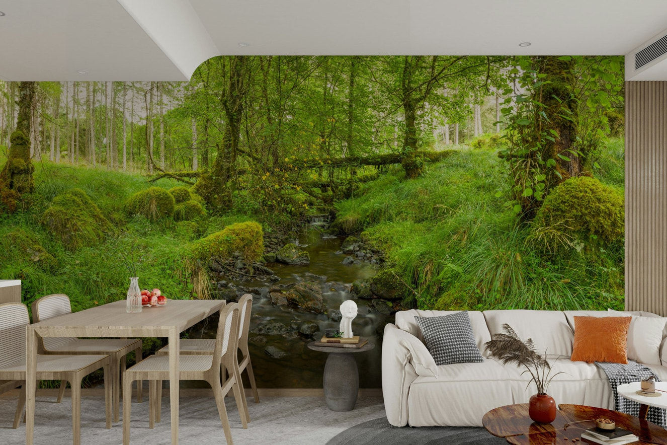 A wall mural of a stream flowing through a forest.

