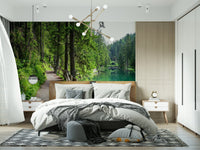 Ethereal emerald lake trail wallpaper with a calm and misty shoreline.