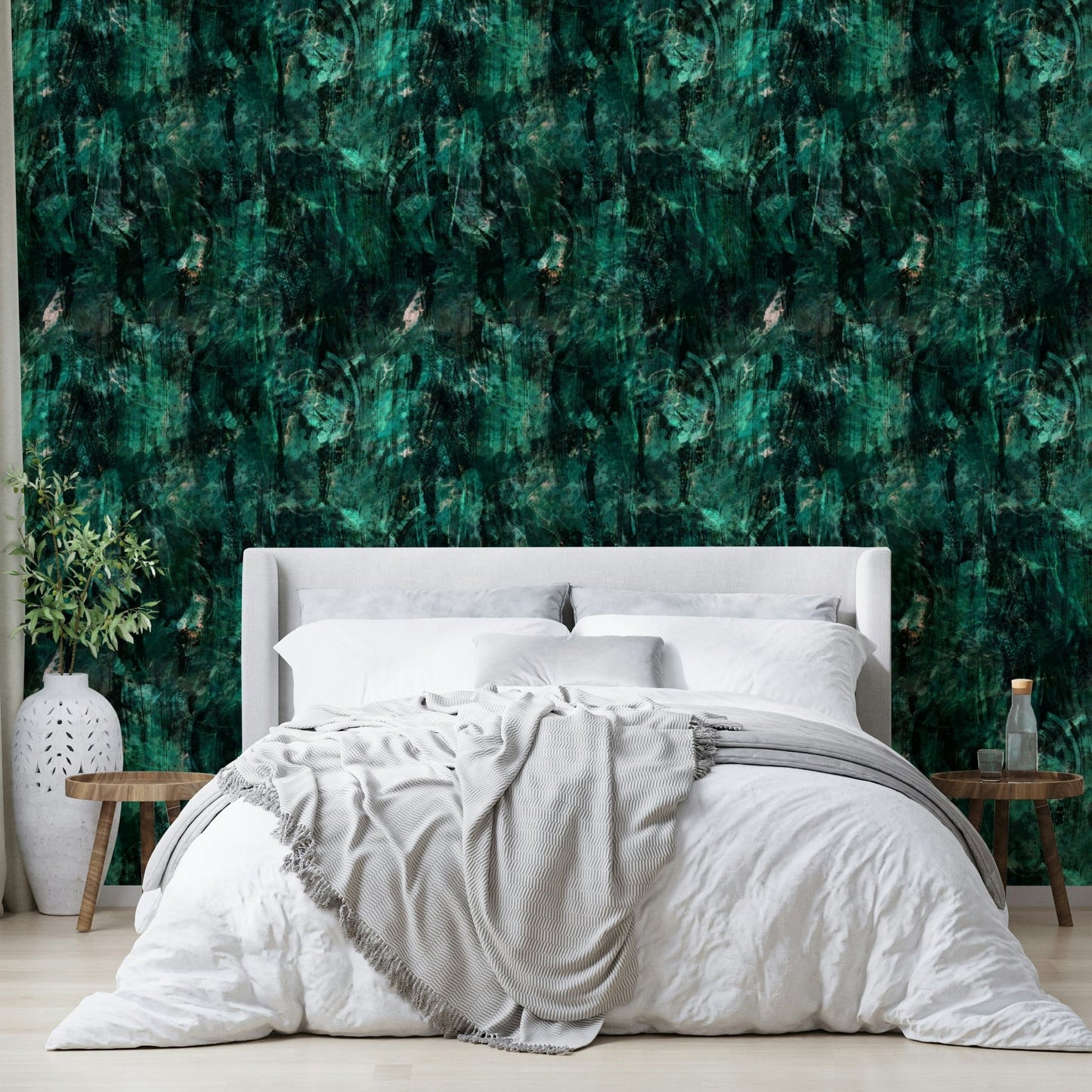 A bedroom with the minimalist mural behind the headboard.

