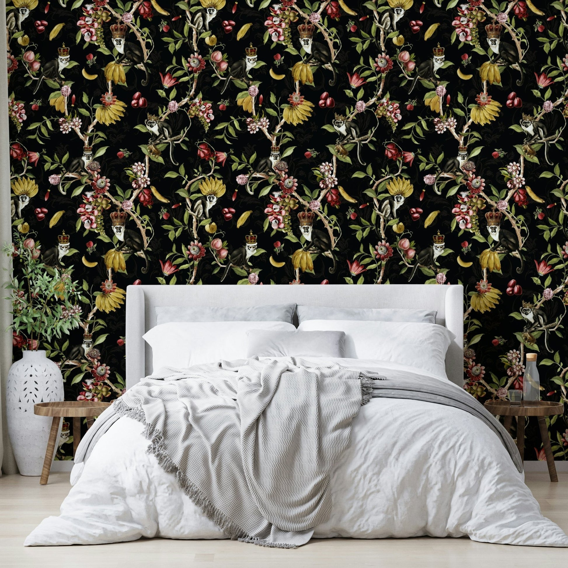Enchanted monkeys surrounded by foliage wallpaper.

