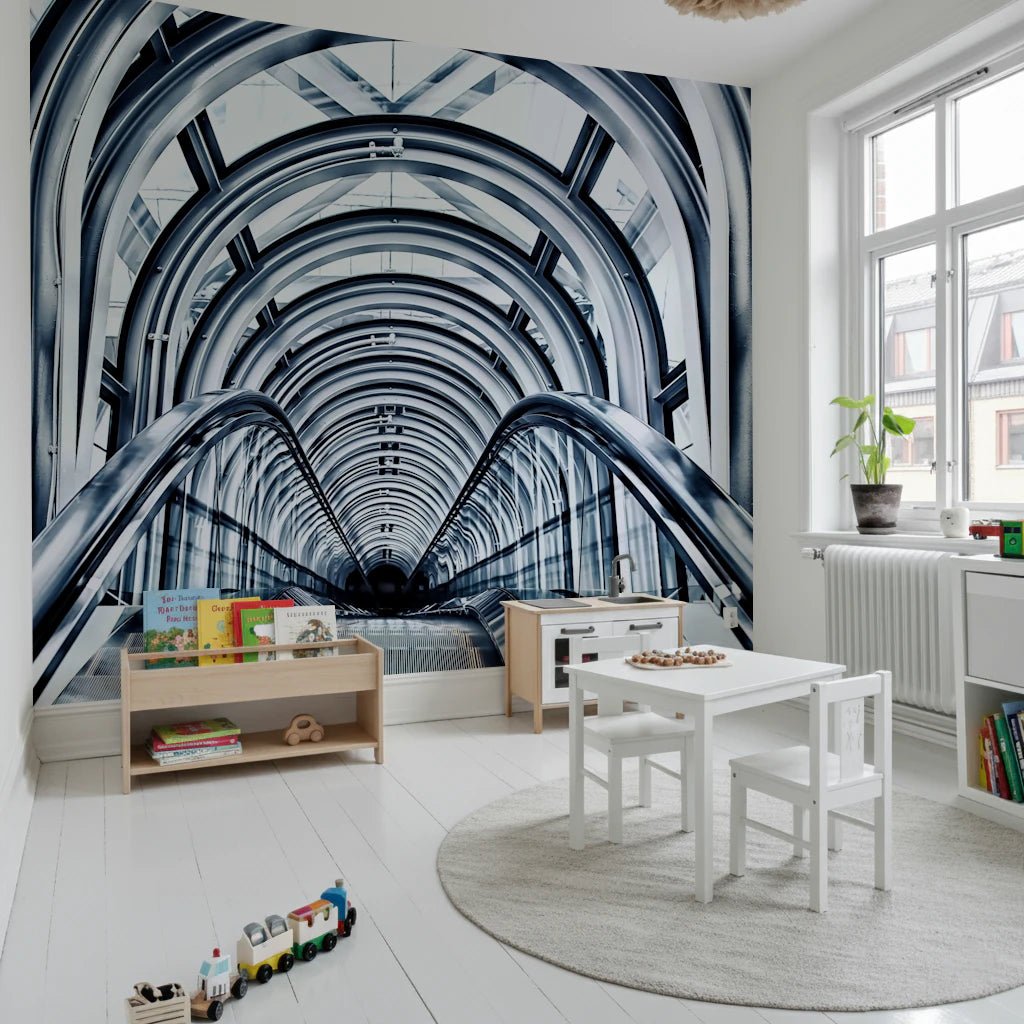 Sharp lines and shadows in urban escalator mural.