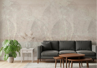 Sitting room with Ethereal Leaves Texture Cream Wall Mural and dark seating