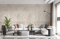 Lounge with Ethereal Leaves Texture Cream Wall Mural and a light sofa setup