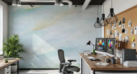 Pale blue wall mural shows gentle brushed texture with soft yellow cream traces