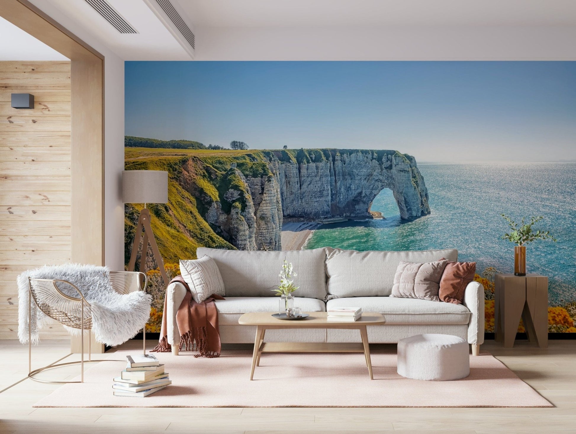 A light-filled family room gains scenic cliffside depth from Etretat's Yellow Bloom Wall Mural