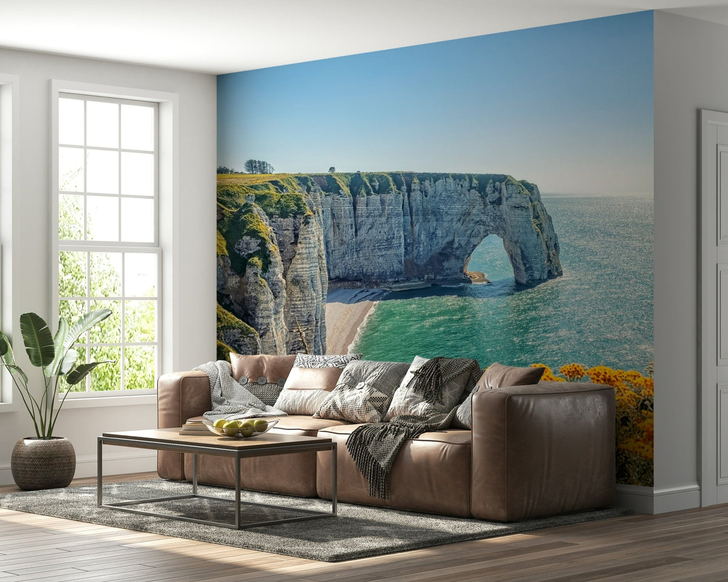Etretat's Yellow Bloom Wall Mural adds sunny shoreline depth to this modern sofa setting
