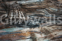 Organic feel of the Eucalyptus Bark Texture peel and stick mural behind a sofa.