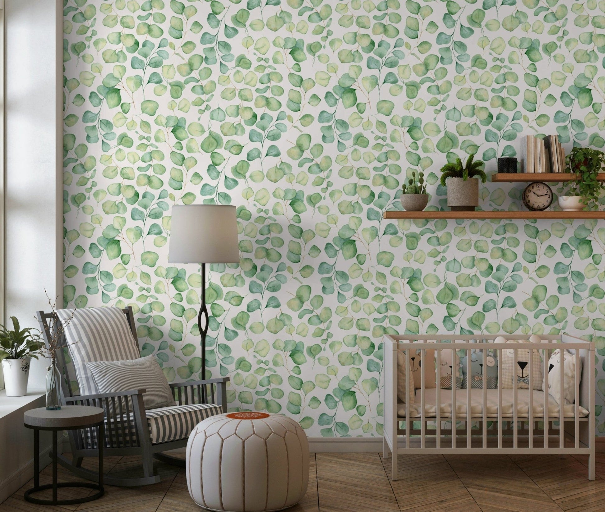 Soft green leaf wallpaper with botanical stems for a nursery wall mural.