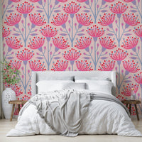 The room feels fresh and lively due to the botanical pattern.

