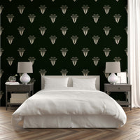 An artistic noir jungle mural on minimalist wallpaper.

