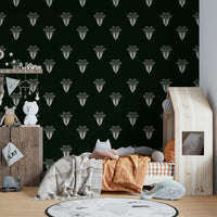 A peaceful exotic jungle mural on decorative wallpaper.

