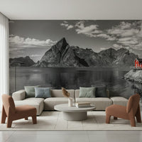 Red cabin accent in a black and white nature mural for a contemporary dining space.