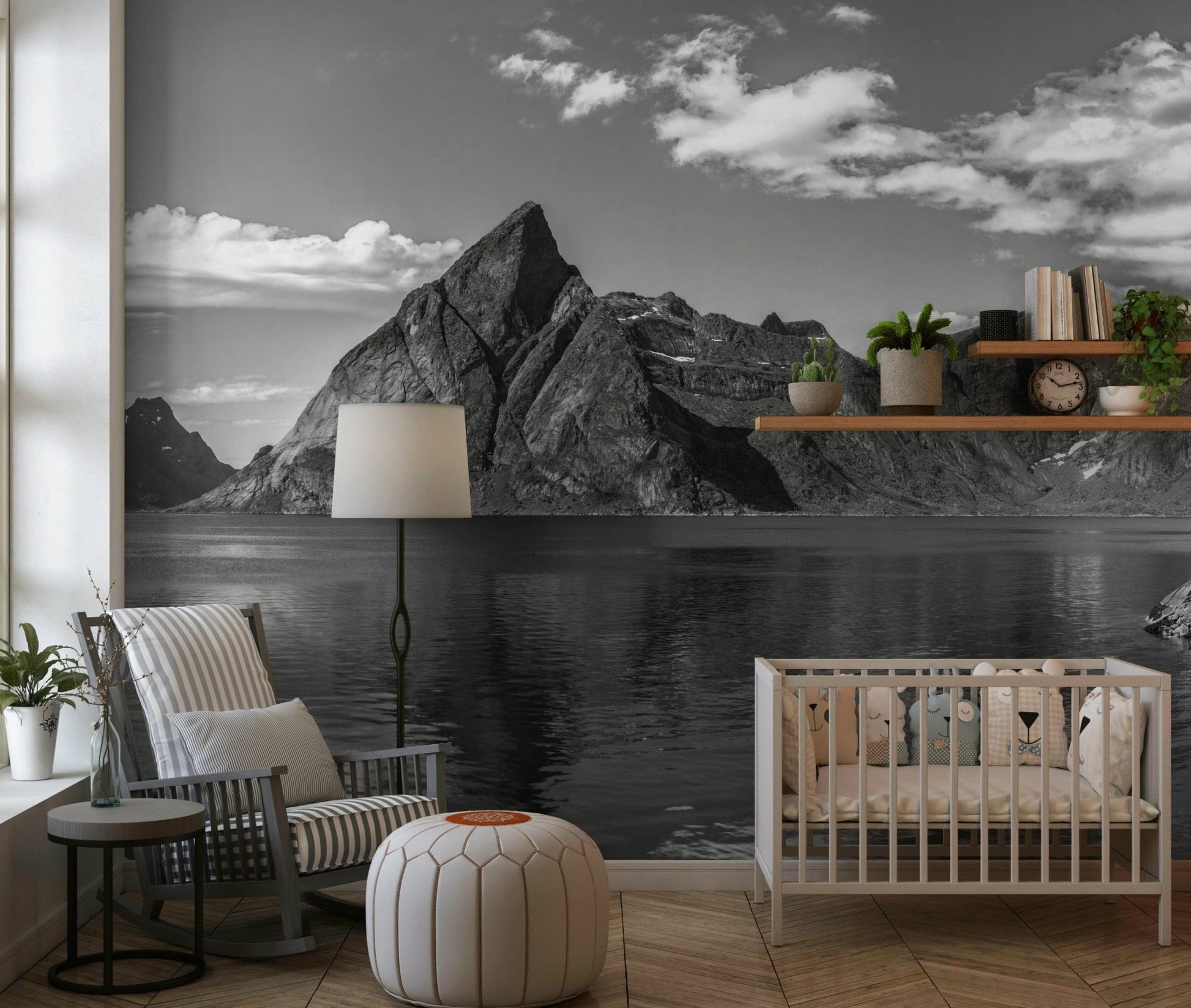 Guest room wall art depicting a serene mountain range reflecting in still water.