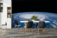 A large, clear, circular area in the center of the storm.

