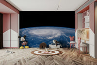 The clouds are shades of gray, white, and dark blue.

