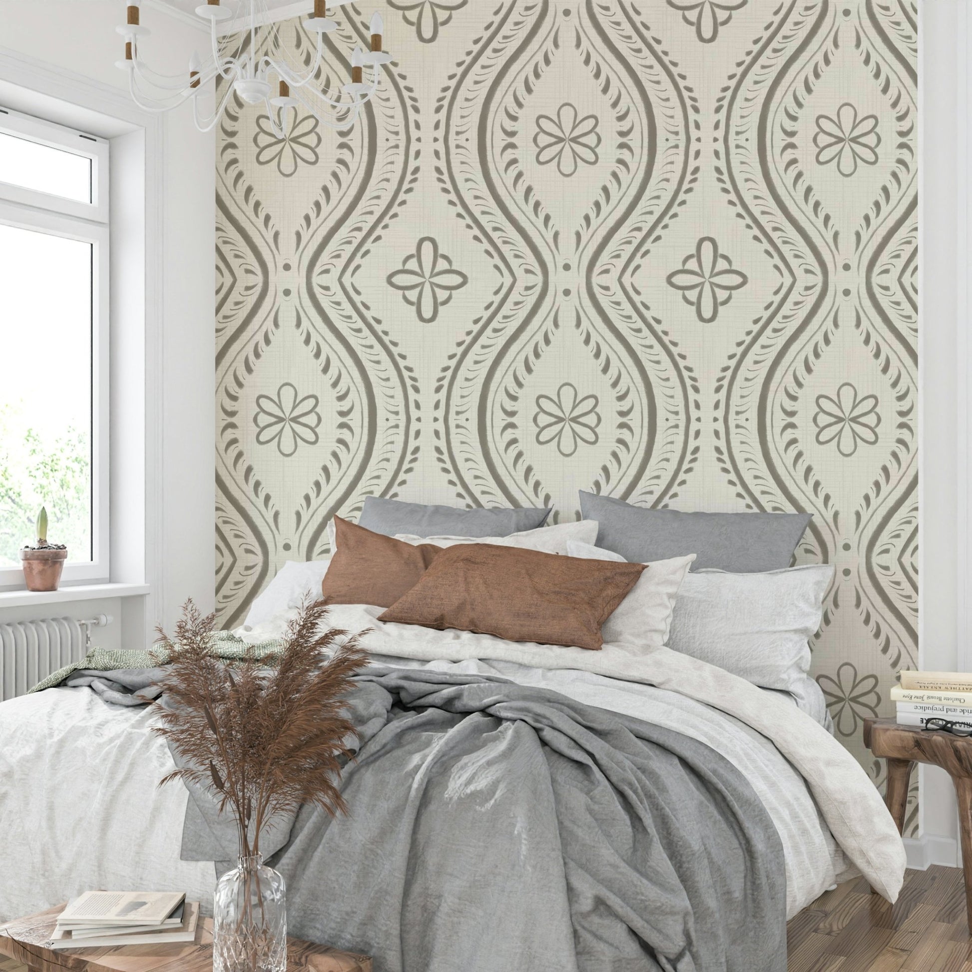 Warm green damask wallpaper with soft faded detailing

