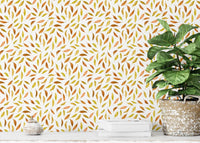 Brown and gold leaves on white base

