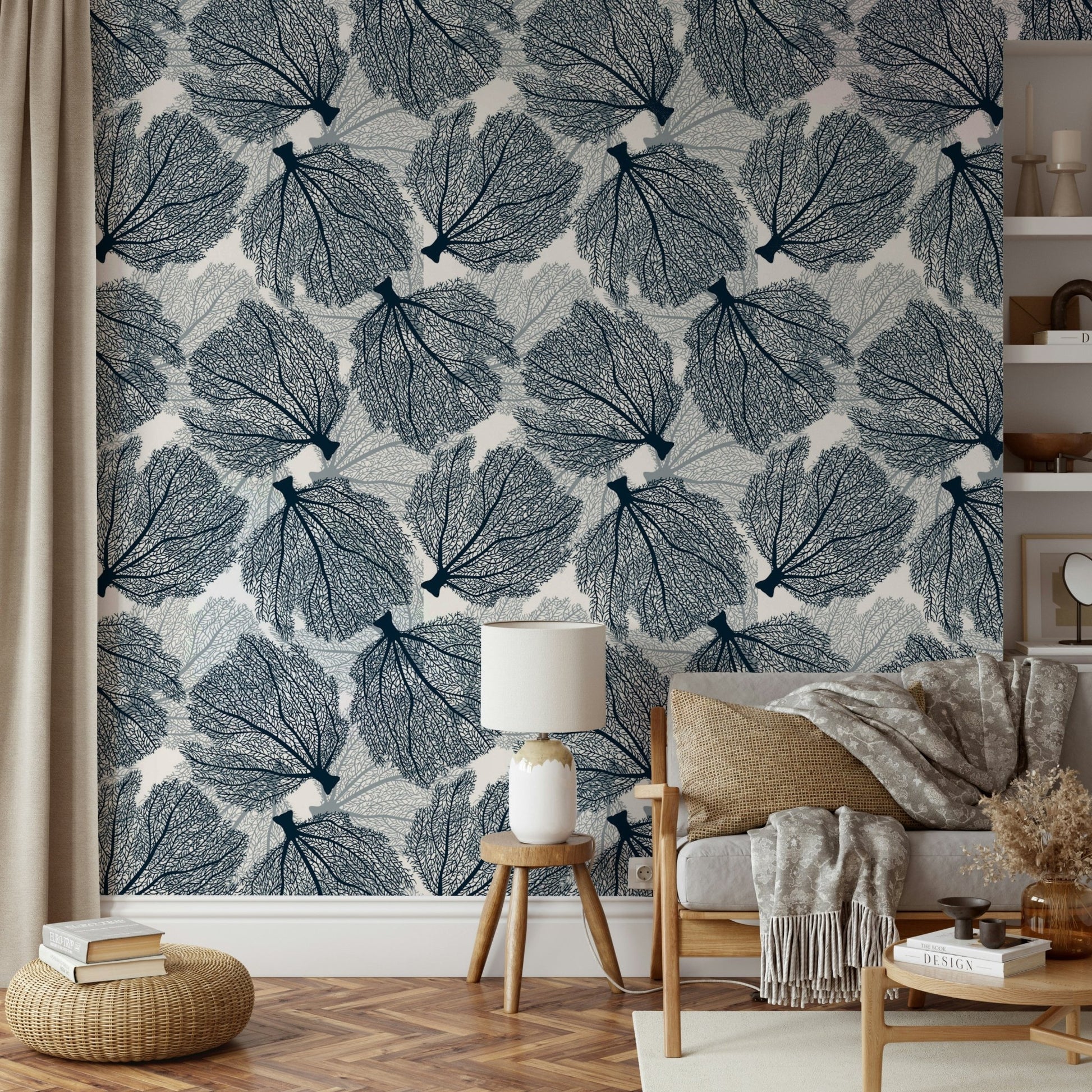Coastal-inspired fan coral wallpaper in navy and white.

