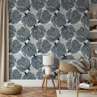Coastal-inspired fan coral wallpaper in navy and white.

