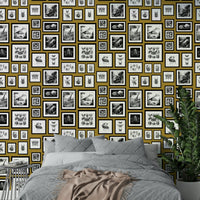 Mustard wallpaper with playful, surreal creatures.

