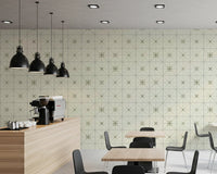 Olive green and cream geometric star pattern mural.