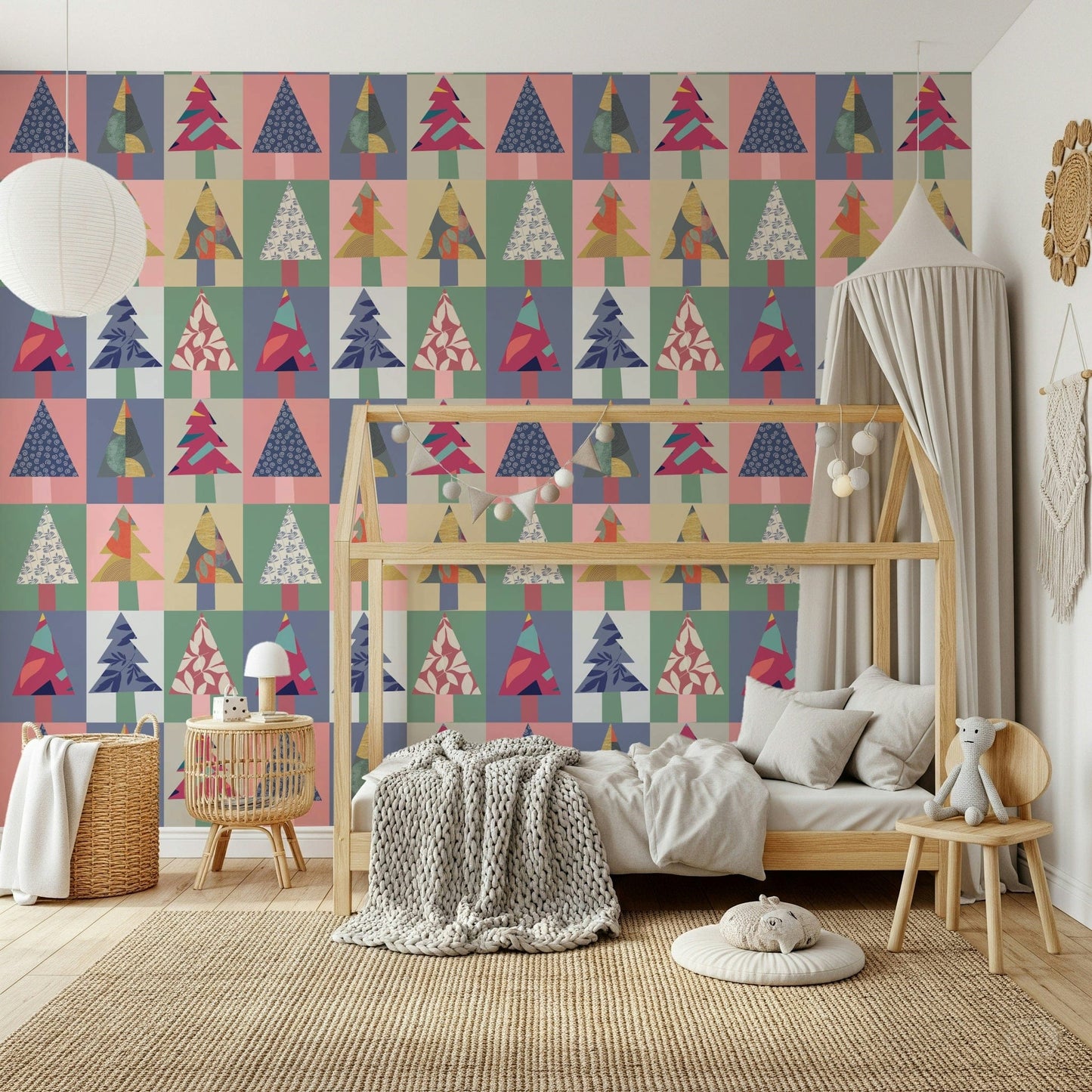 Forest wallpaper with delicate winter patterns in a bright home office.