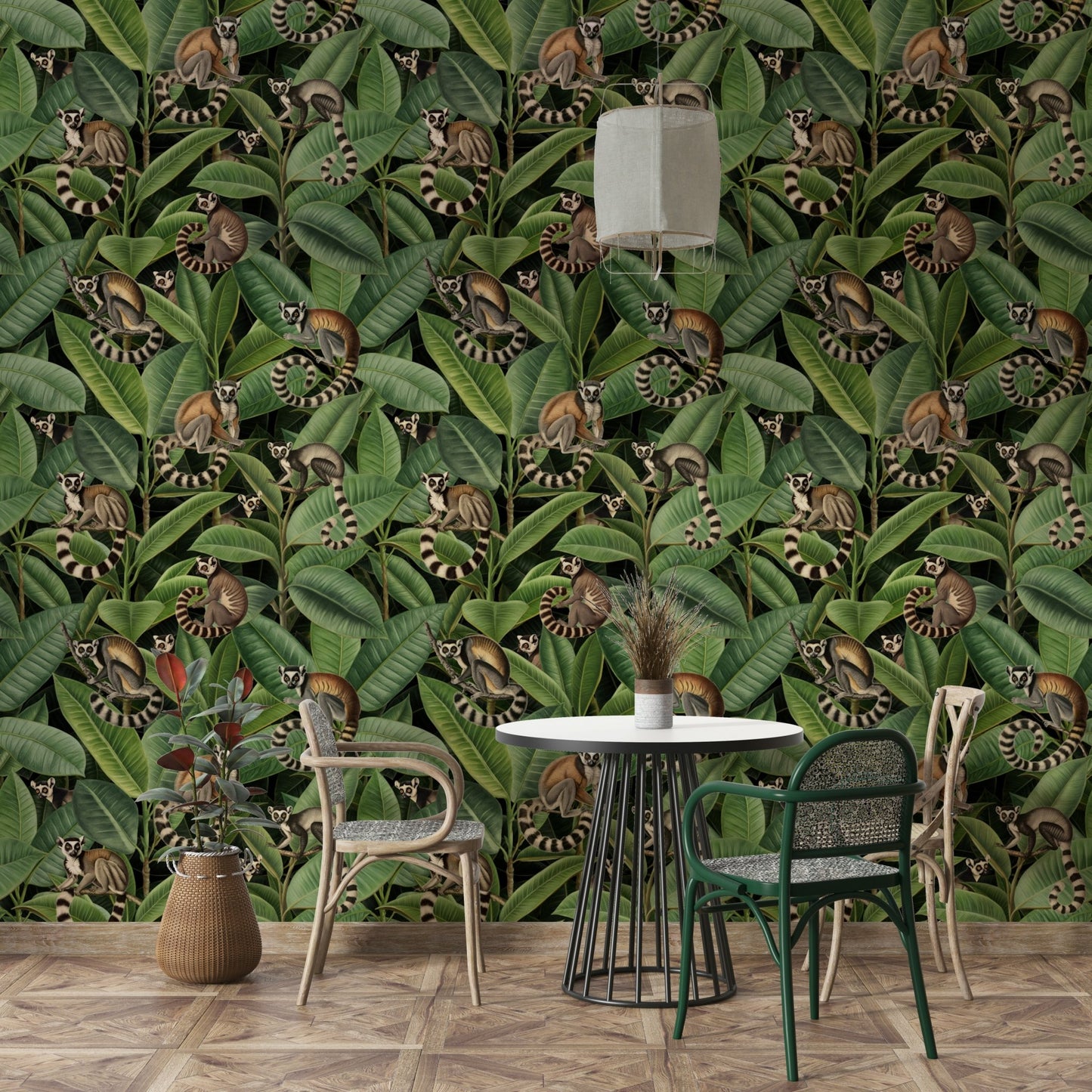 Detailed view of the lush ficus leaves and monkeys

