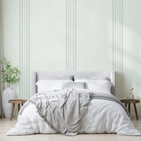 Wallpaper with fine stripe pattern and light hues
