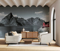 Fjord Home Wall Mural featuring bright red cabin on grey rocky coast., GD6714