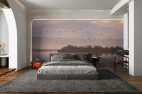 Flock of birds at sunset wall art
