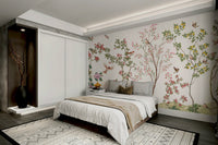 An elegant wall mural with a pattern of birds and flowers.

