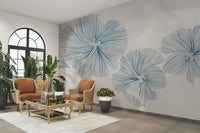 A minimalist wall mural featuring a pattern of flowers.

