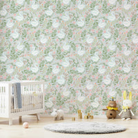 The image shows an artistic impression of a serene scene with swans on a lake and floral elements.

