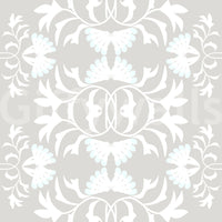 Graceful white vine wall mural over solid light grey.